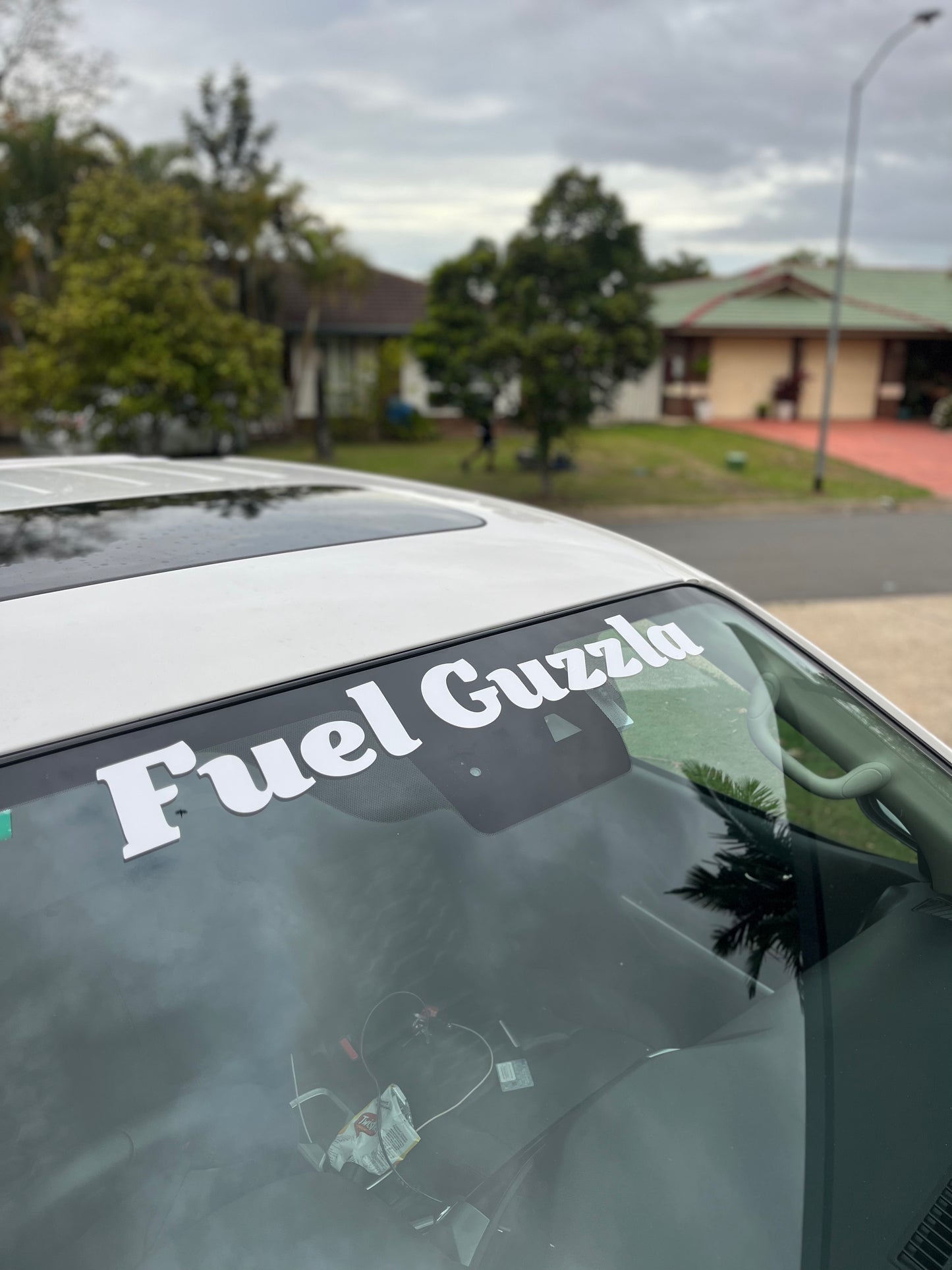 Fuel Guzzla Window Banner