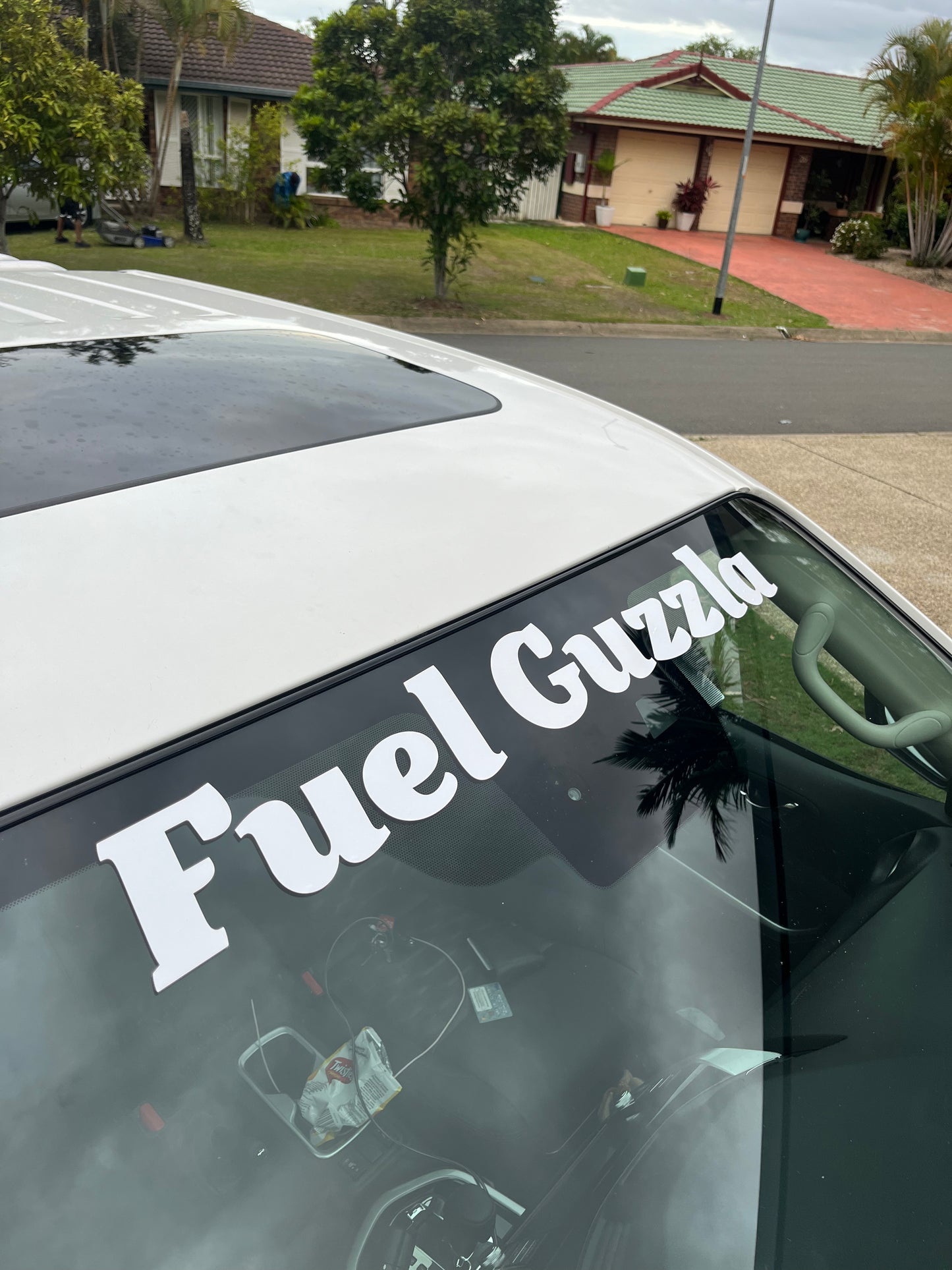 Fuel Guzzla Window Banner